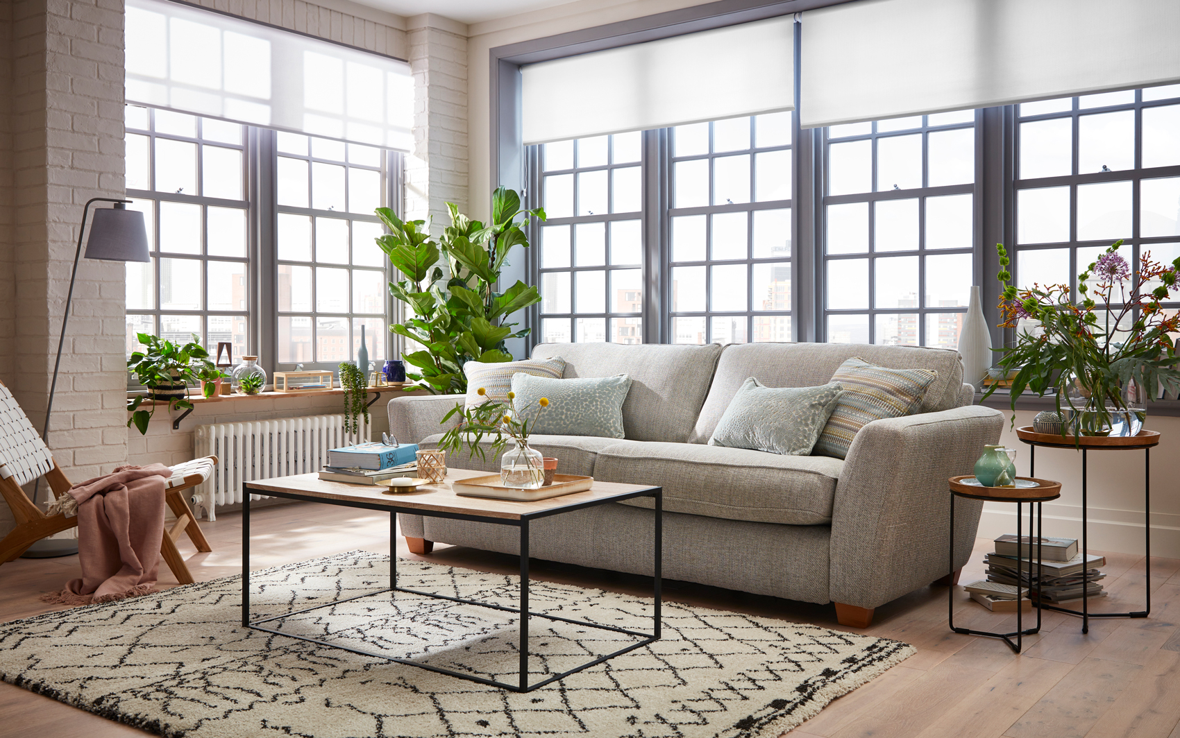 Luxury sofa in penthouse roomset photography